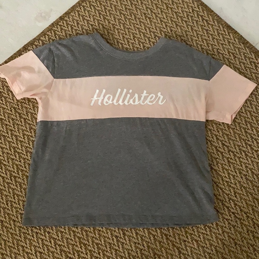 grey with pink strip size small tee from hollister